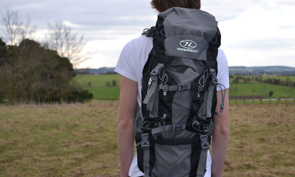Young person with a rucksack on his back